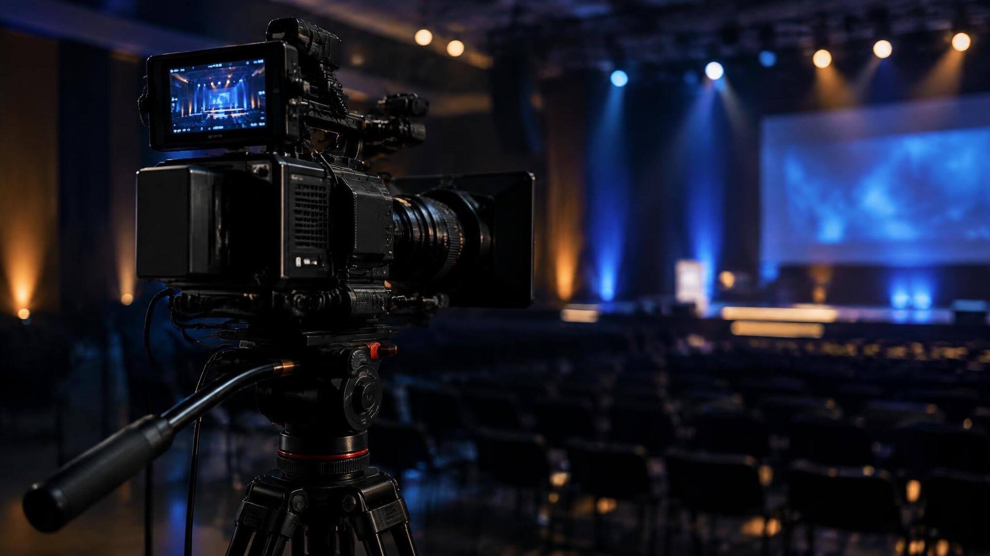 Professional cinema camera on a tripod at an event