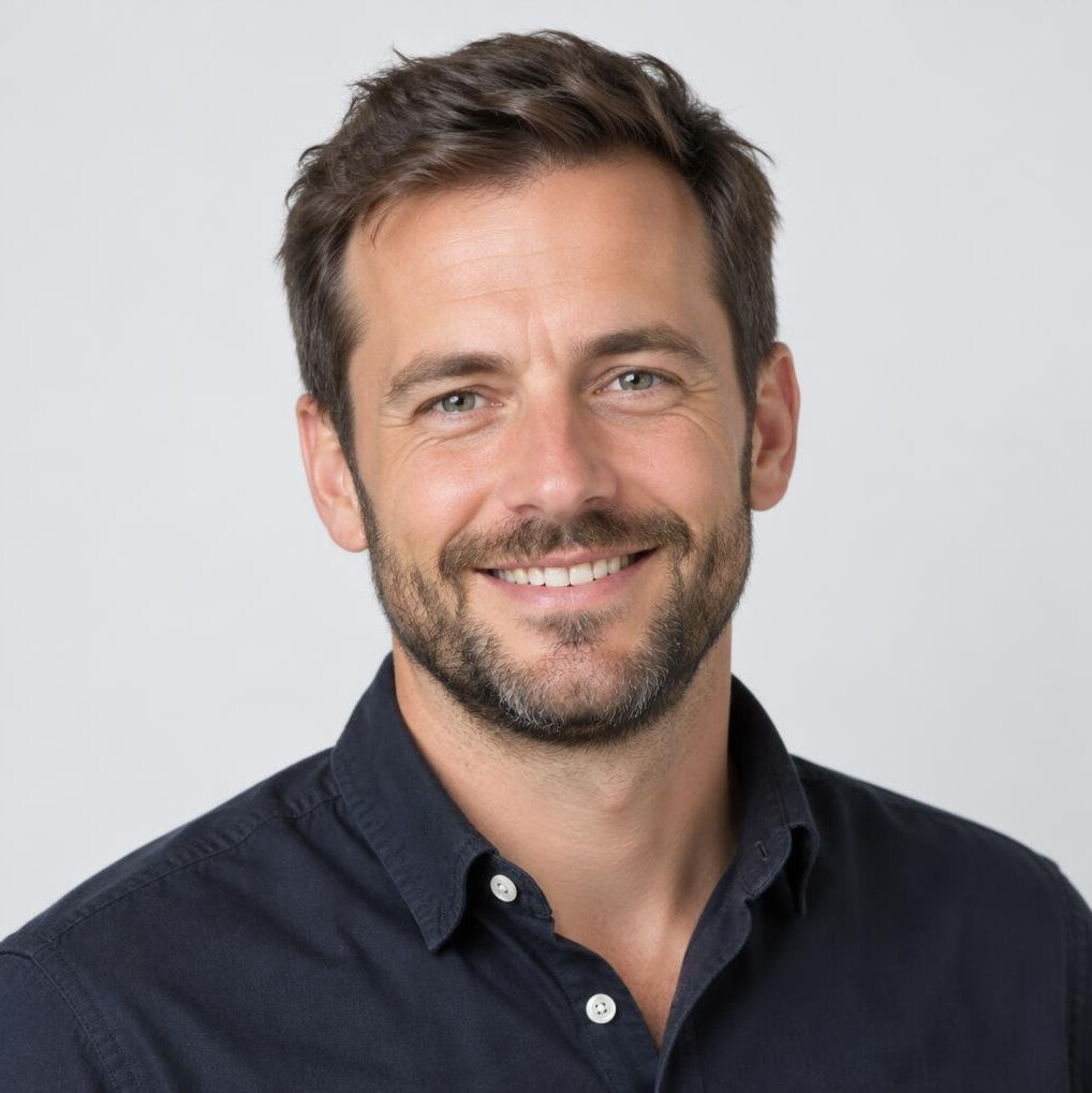 Portrait of a smiling man with a short beard